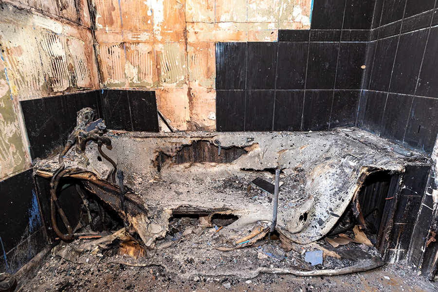 Fire damage - melted bath